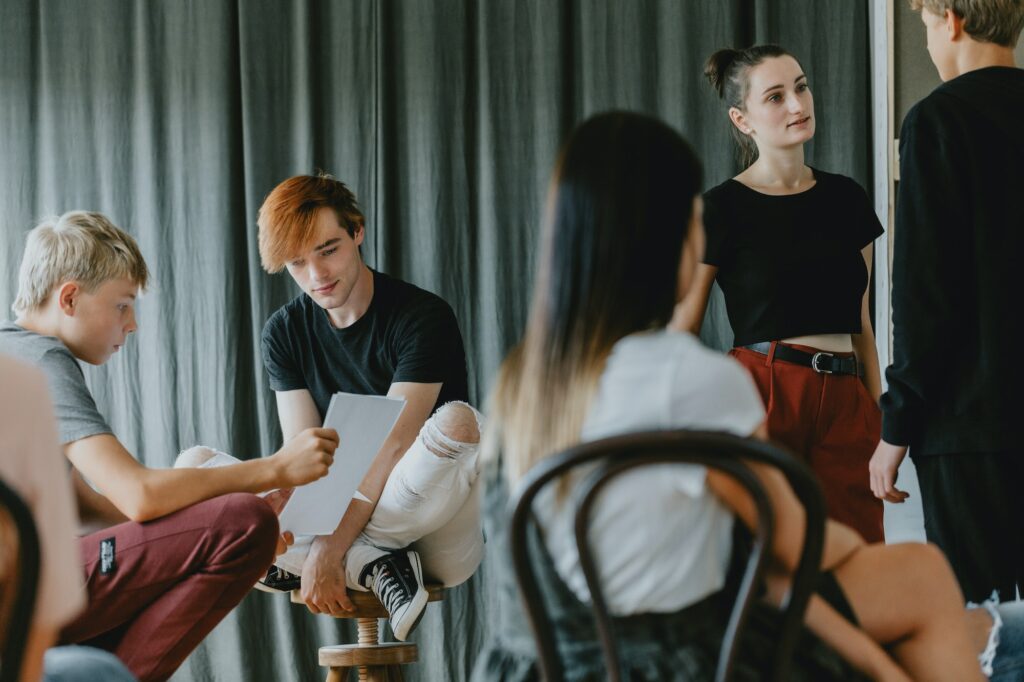 Teenagers in theatre club