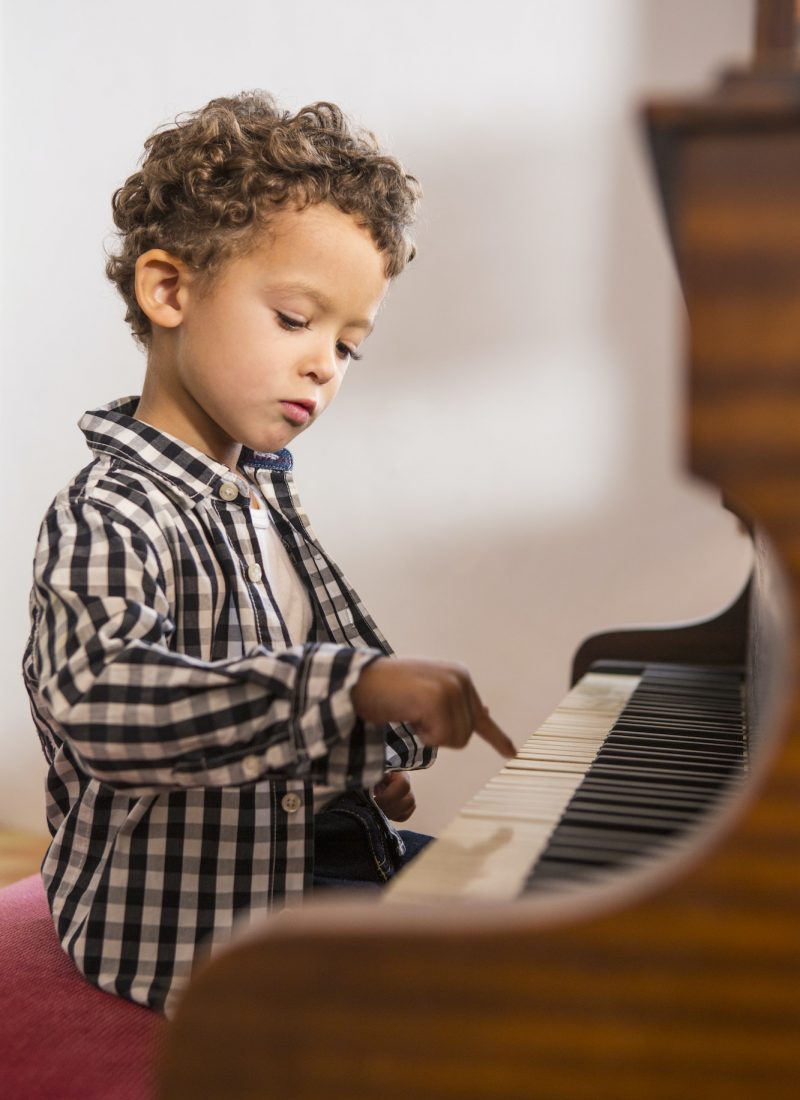 Boy playing piano Boy playing piano